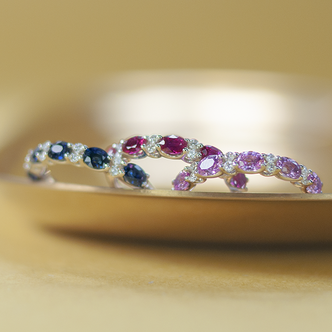 Oval ruby diamond band